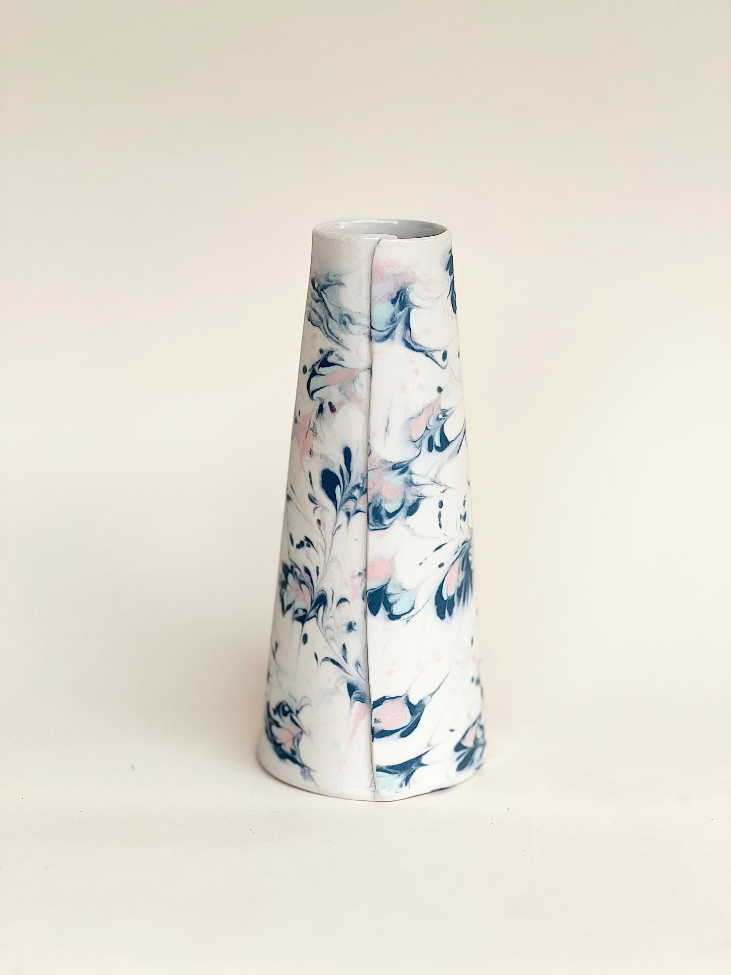 Conical vase - splash colors blue, pink and pale blue on white background