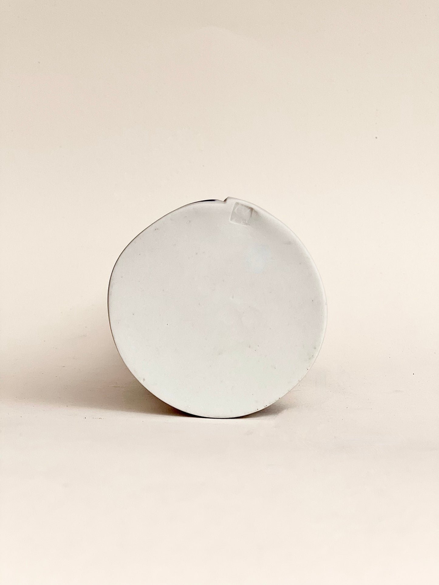 conical vase - splash colors blurred,pale green on white background
