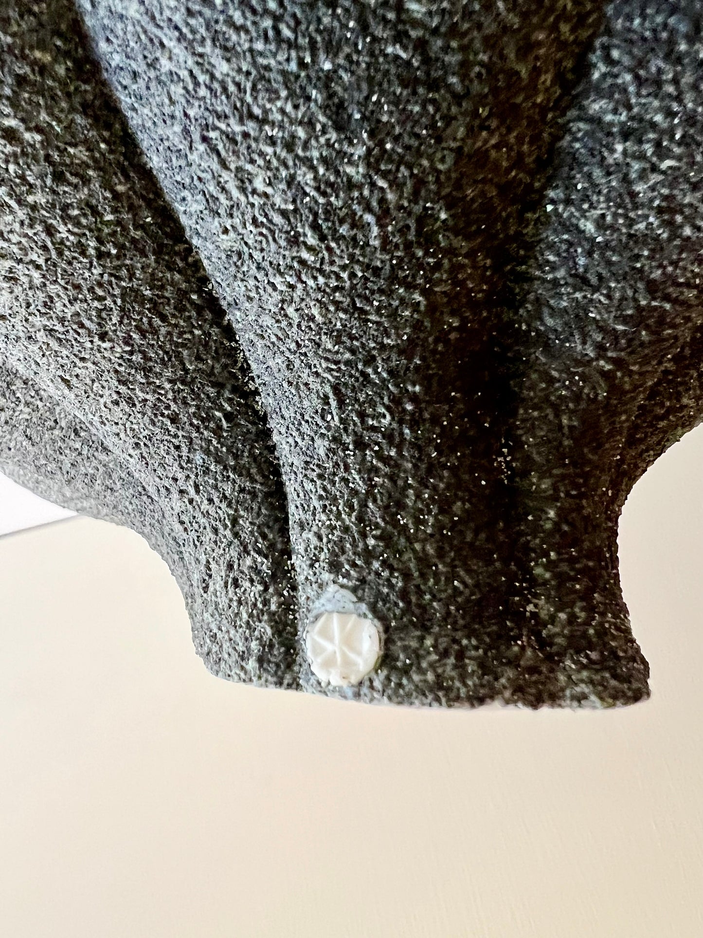 Detail of the artist stamp on the back of Crazy Wallflower — Pollen porcelain wall sculpture