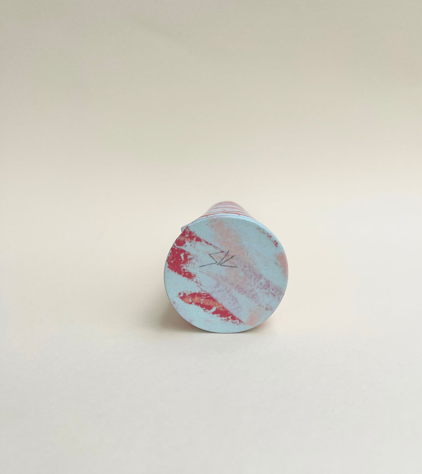 Conical vases - red and pink on pale blue background