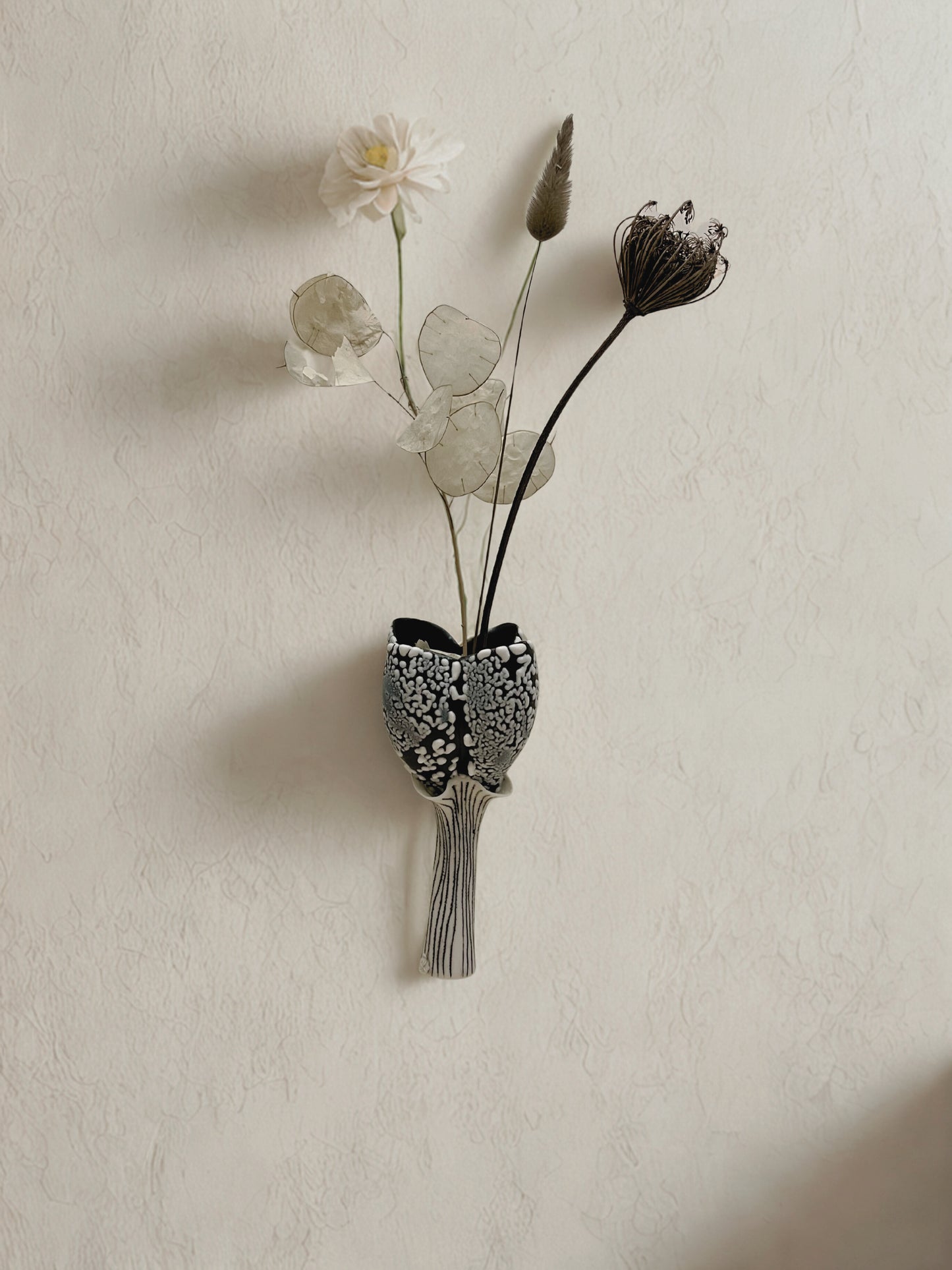 Overall view with object attached to wall