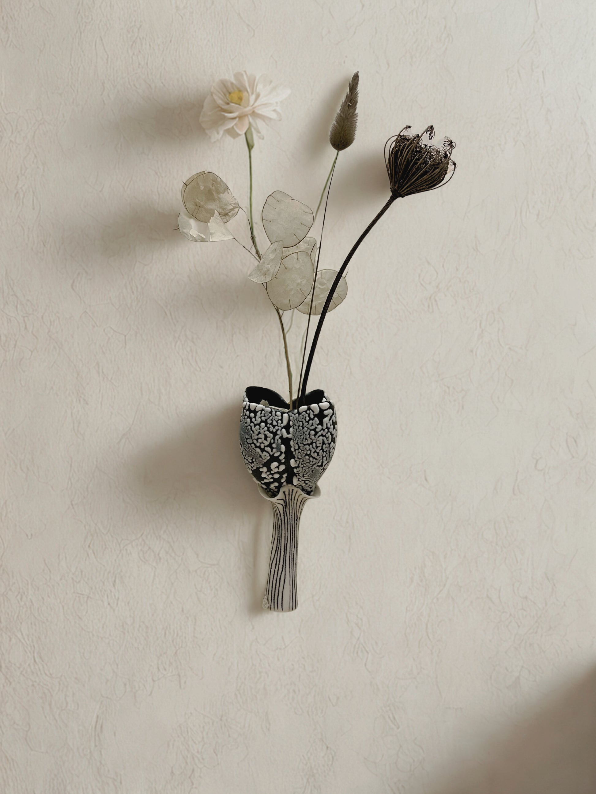 Overall view with object attached to wall