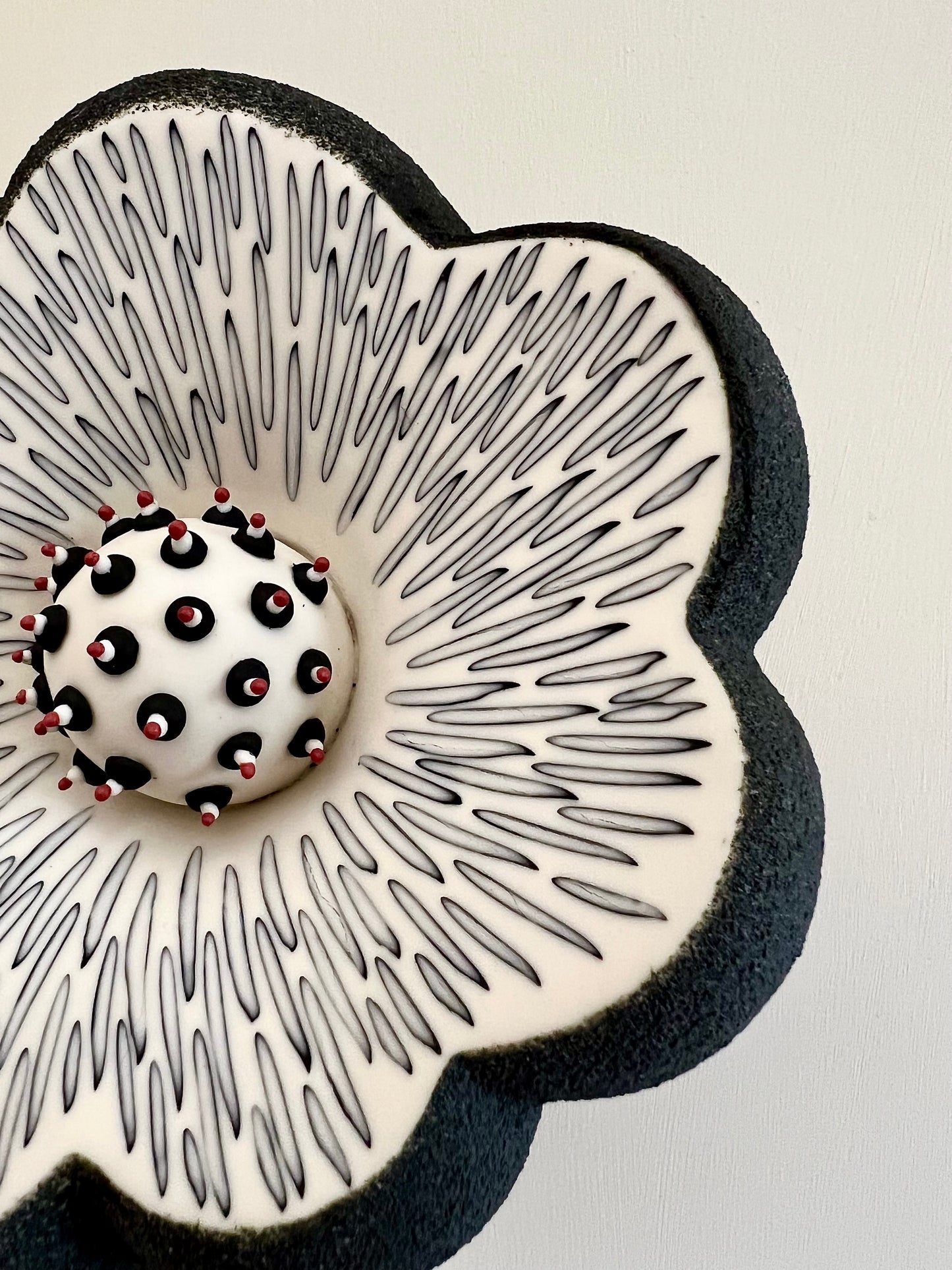 Close-up of the white porcelain interior with hand-incised inlay decoration on Crazy Wallflower — Pollen
