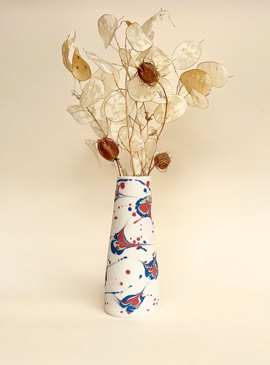conical vase - splash colors blurred,pale green on white background