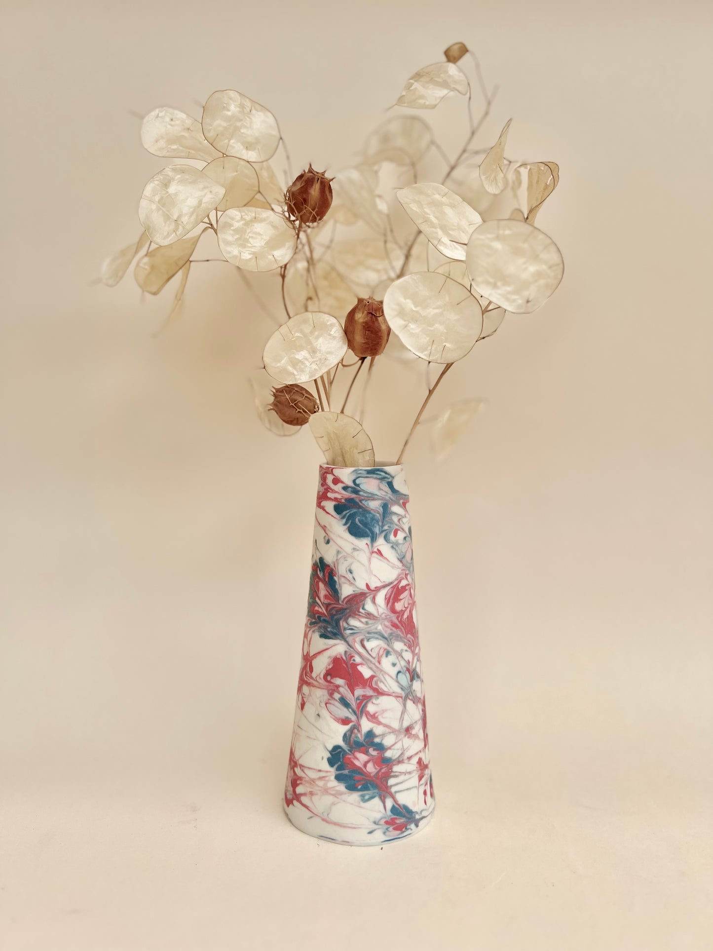 Conical vases - splash colors red, blue, pink on white background