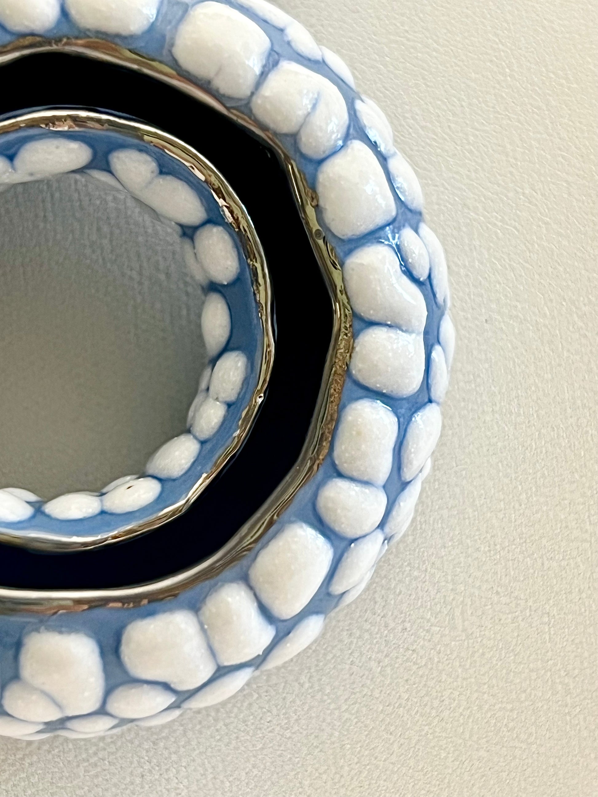 Detail of platinum and glaze