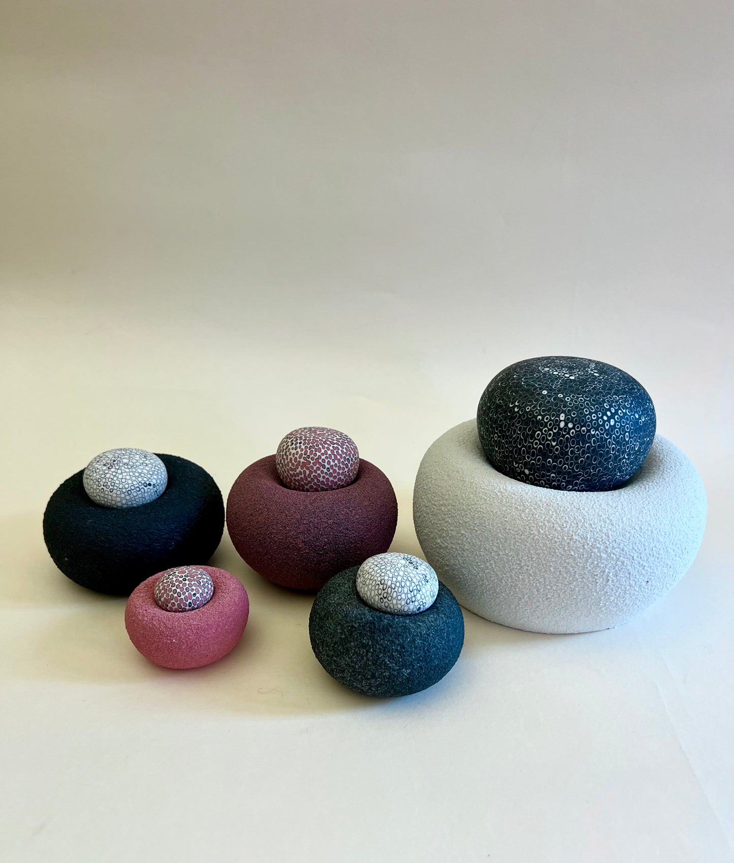 Handmade porcelain sculpture with five modular elements that can be arranged in different compositions.