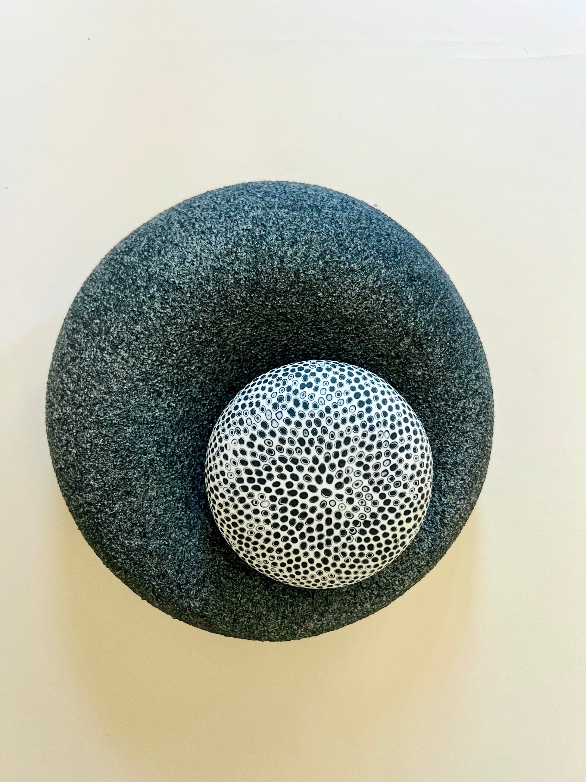 Contemporary ceramic sculpture inspired by organic forms, combining texture, pattern and contrasting surfaces.
