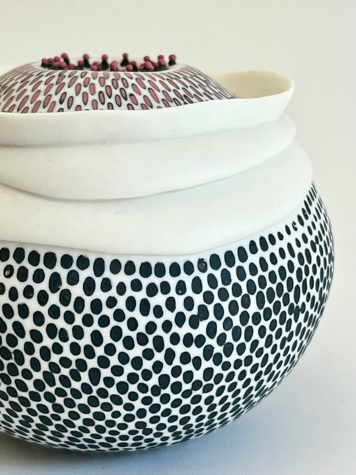 Detail of Pulse II showing the individually applied black porcelain marks