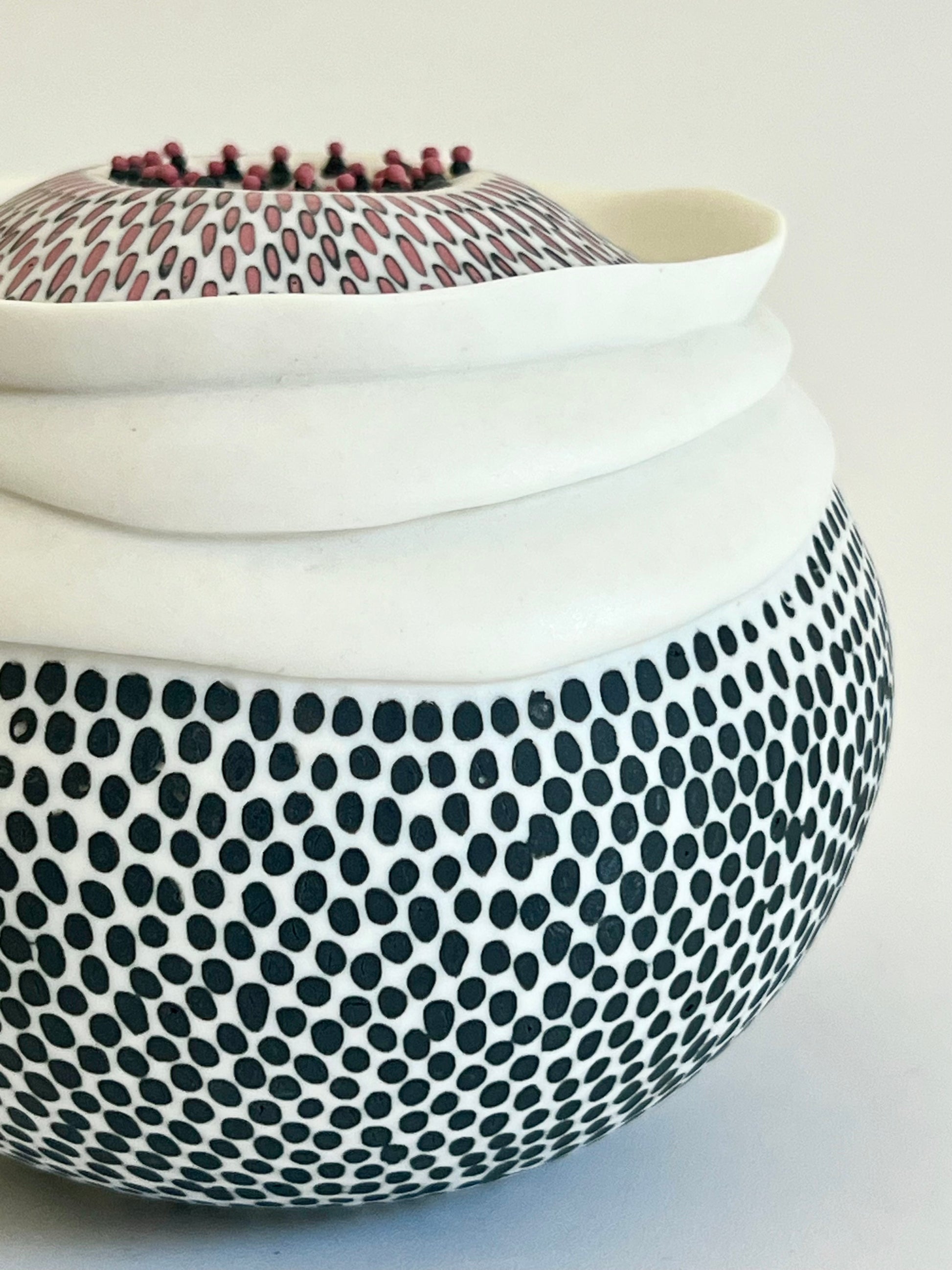Detail of Pulse II showing the individually applied black porcelain marks